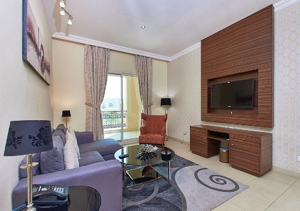 TV a/nebo společenská místnost v ubytování Mughal Suites