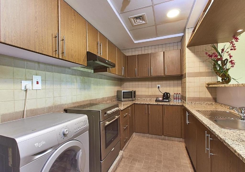Kuchyň nebo kuchyňský kout v ubytování Mughal Suites