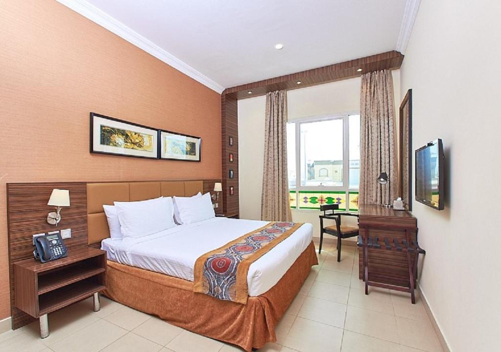 Postel nebo postele na pokoji v ubytování Mughal Suites