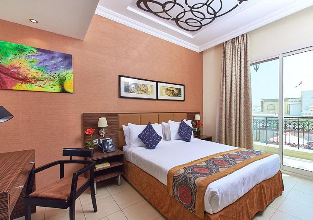 Postel nebo postele na pokoji v ubytování Mughal Suites