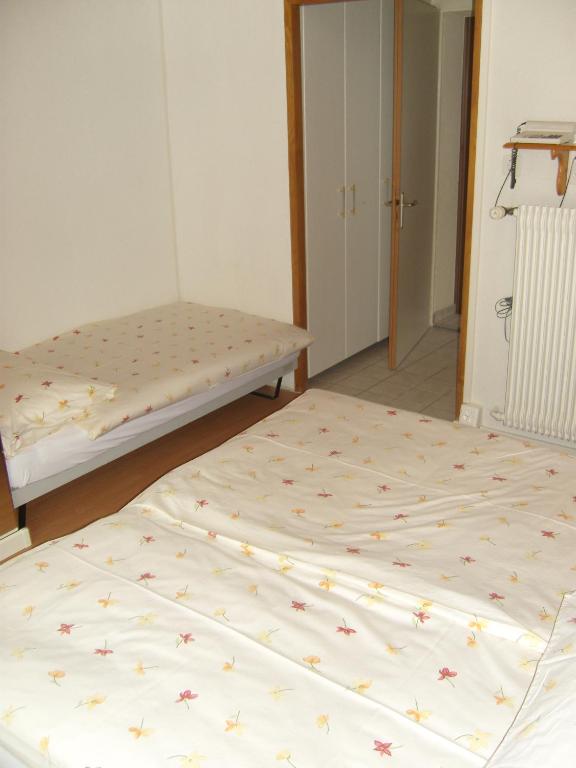 Postel nebo postele na pokoji v ubytování Vista Resort Hostel