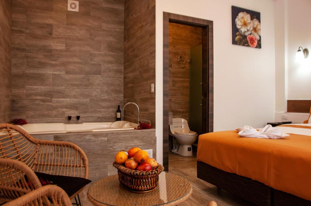 Postel nebo postele na pokoji v ubytování Toucan Platinum Suites Aparthotel