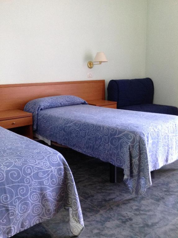 Postel nebo postele na pokoji v ubytování Scacco Matto