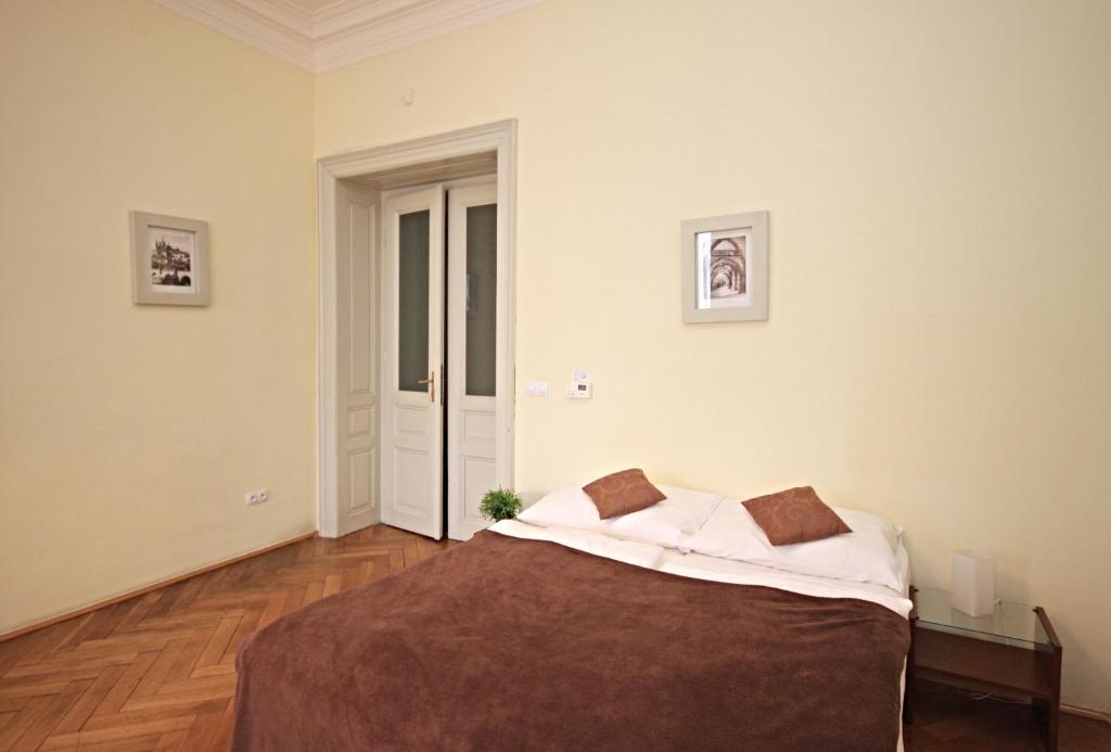 Postel nebo postele na pokoji v ubytování River View Residence