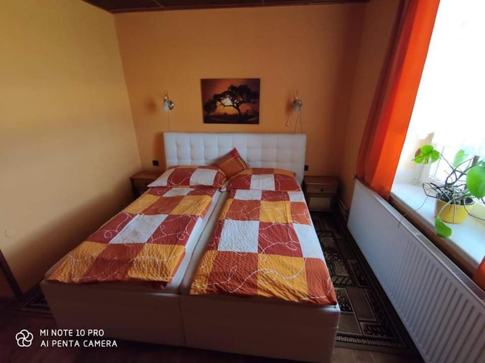 Postel nebo postele na pokoji v ubytování Motel Podkova