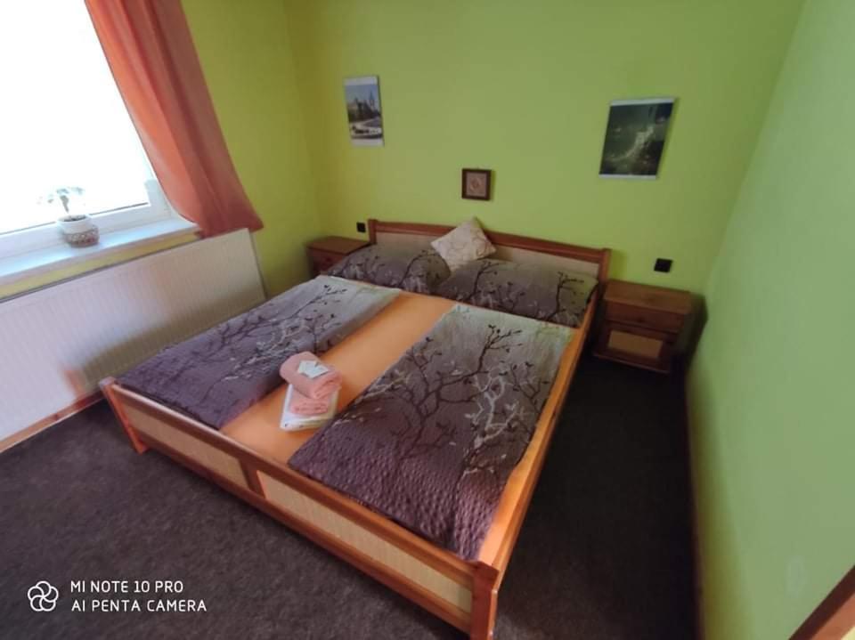 Postel nebo postele na pokoji v ubytování Motel Podkova