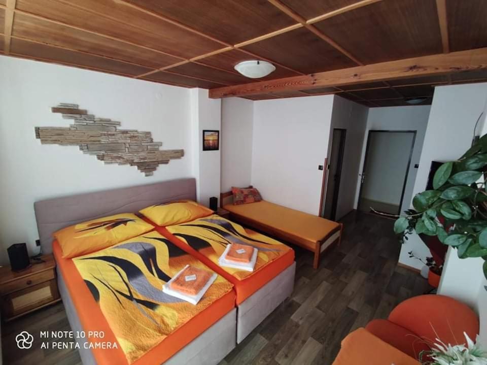 Postel nebo postele na pokoji v ubytování Motel Podkova