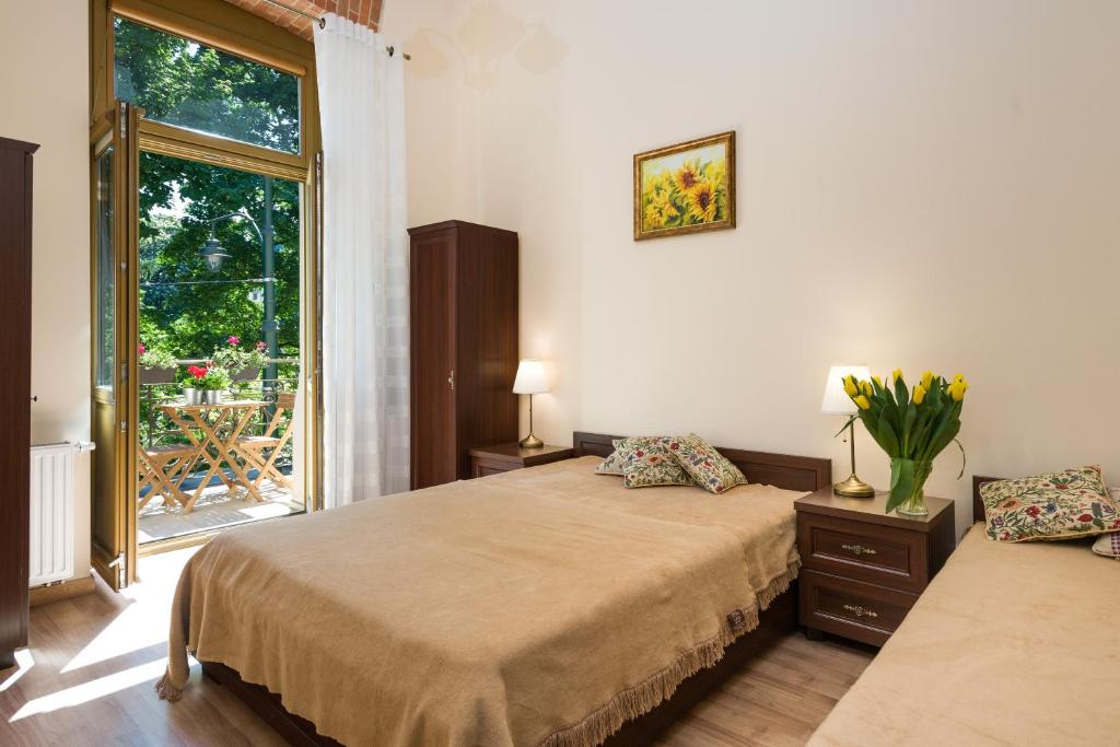 Posteľ alebo postele v izbe v ubytovaní Vanilla 6 Apartment