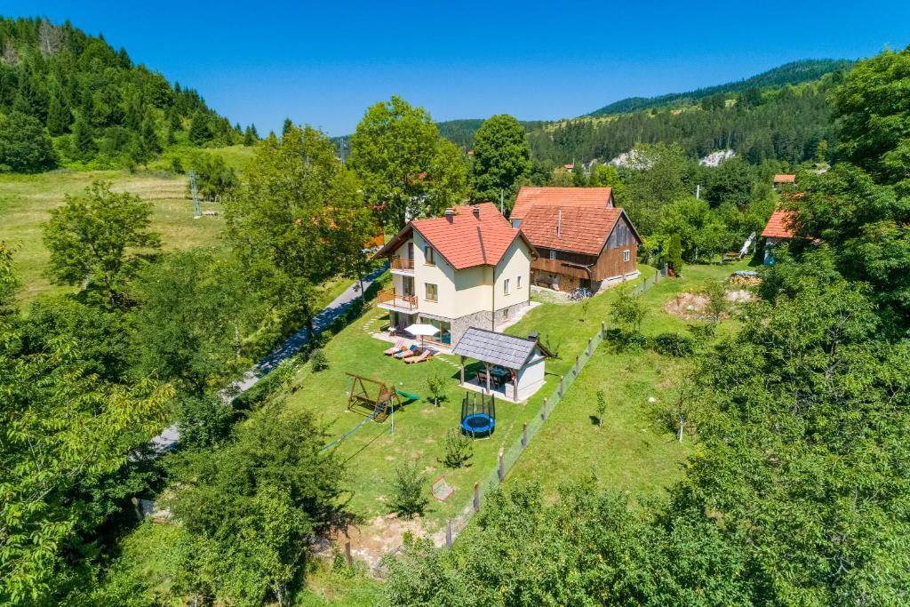 an aerial view of a house in the woods at Dolina in Moravice