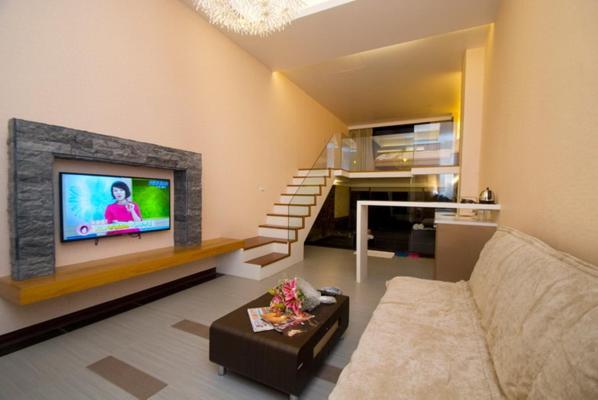 TV a/nebo společenská místnost v ubytování 礁溪景觀溫泉會館
