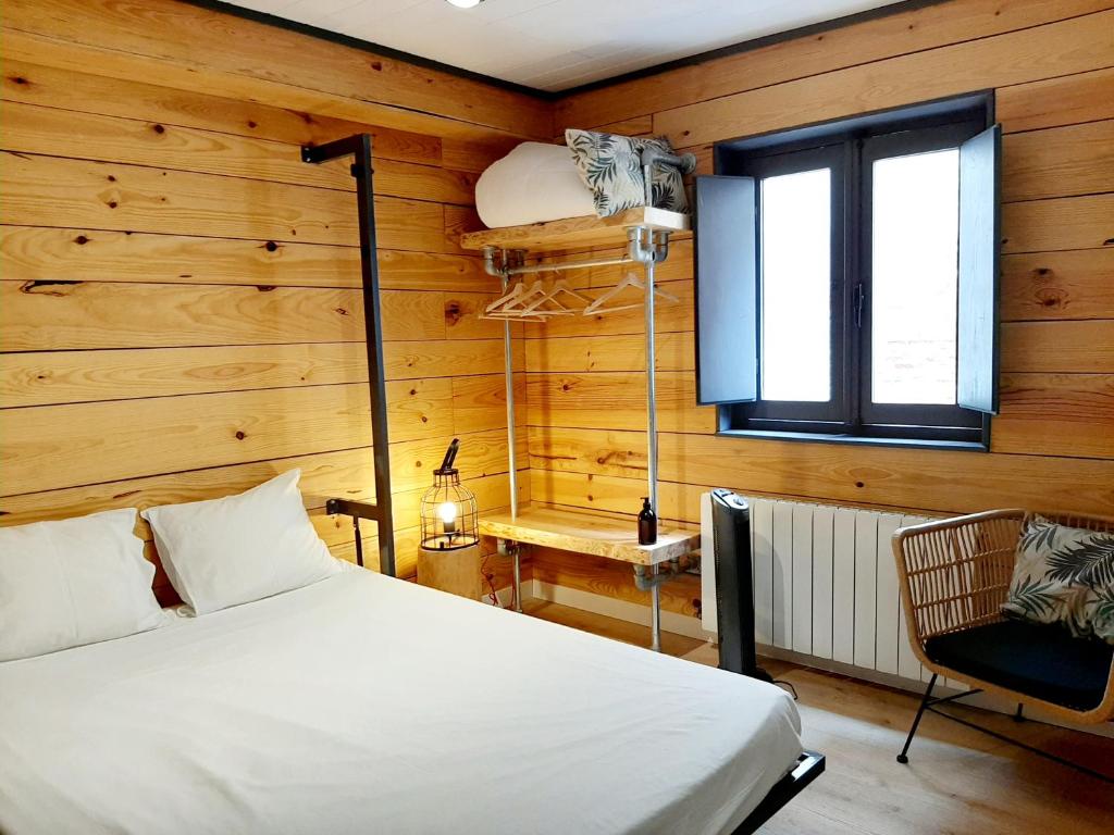 Krevet ili kreveti u jedinici u okviru objekta Hostal Erasmus by gaiarooms