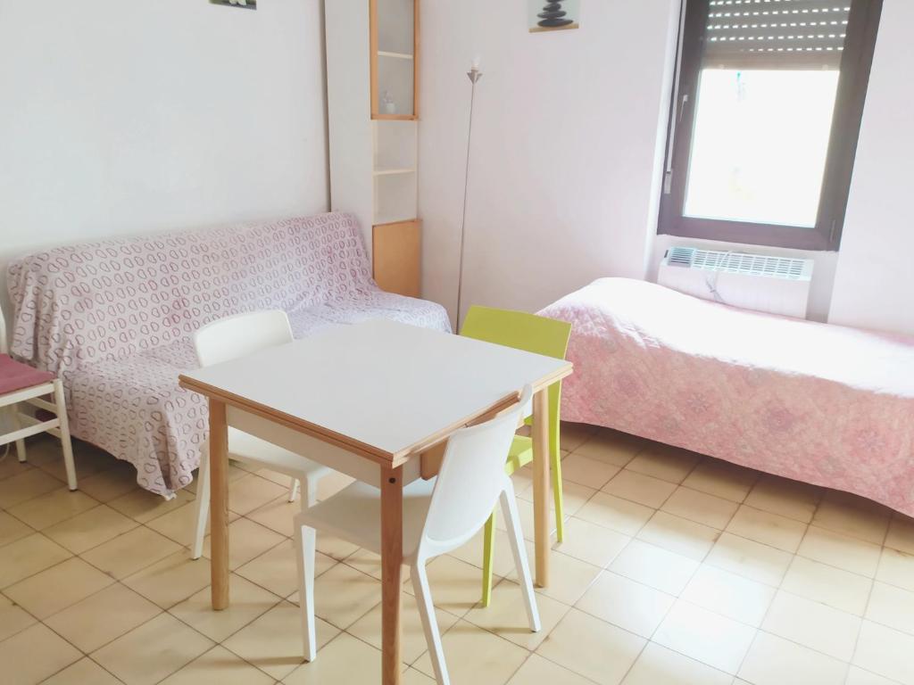 Łóżko lub łóżka w pokoju w obiekcie Centro Piave Apartment