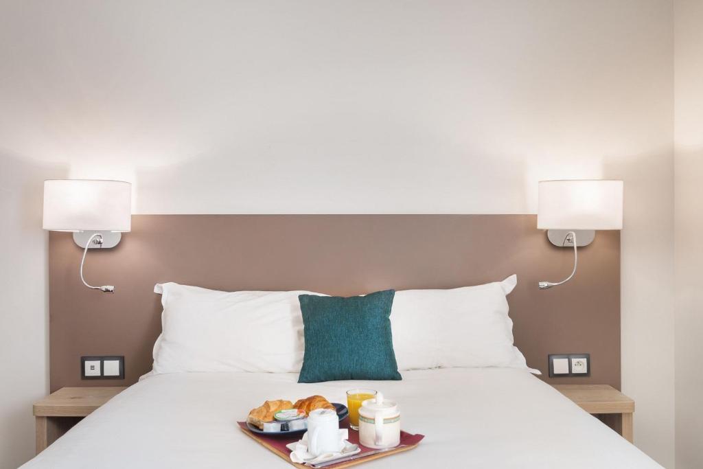 Postel nebo postele na pokoji v ubytování Courcelles Médéric