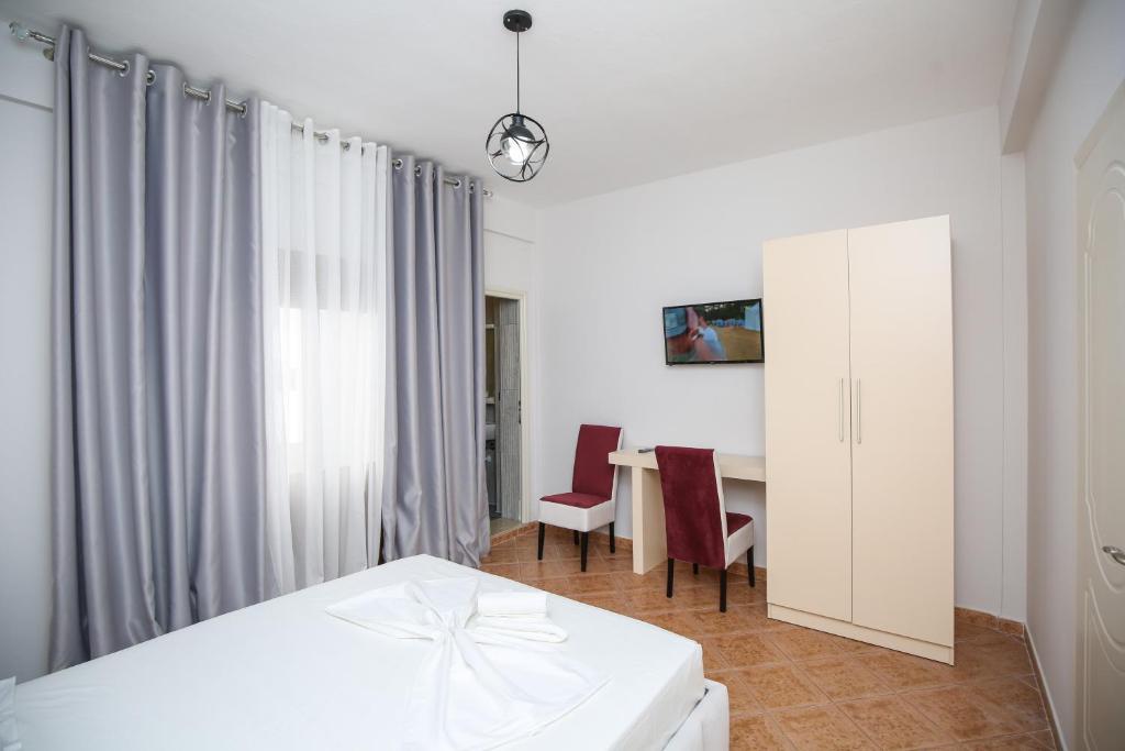 Postel nebo postele na pokoji v ubytování Hotel Vila Stefa