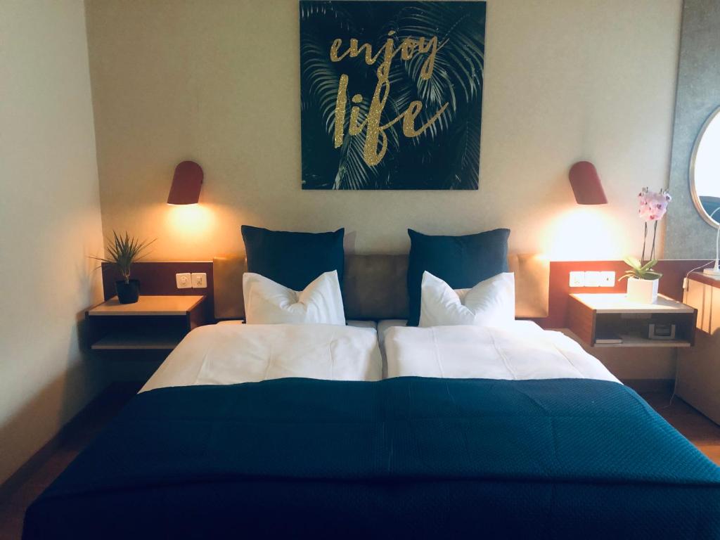 Postel nebo postele na pokoji v ubytování Hotel Casino