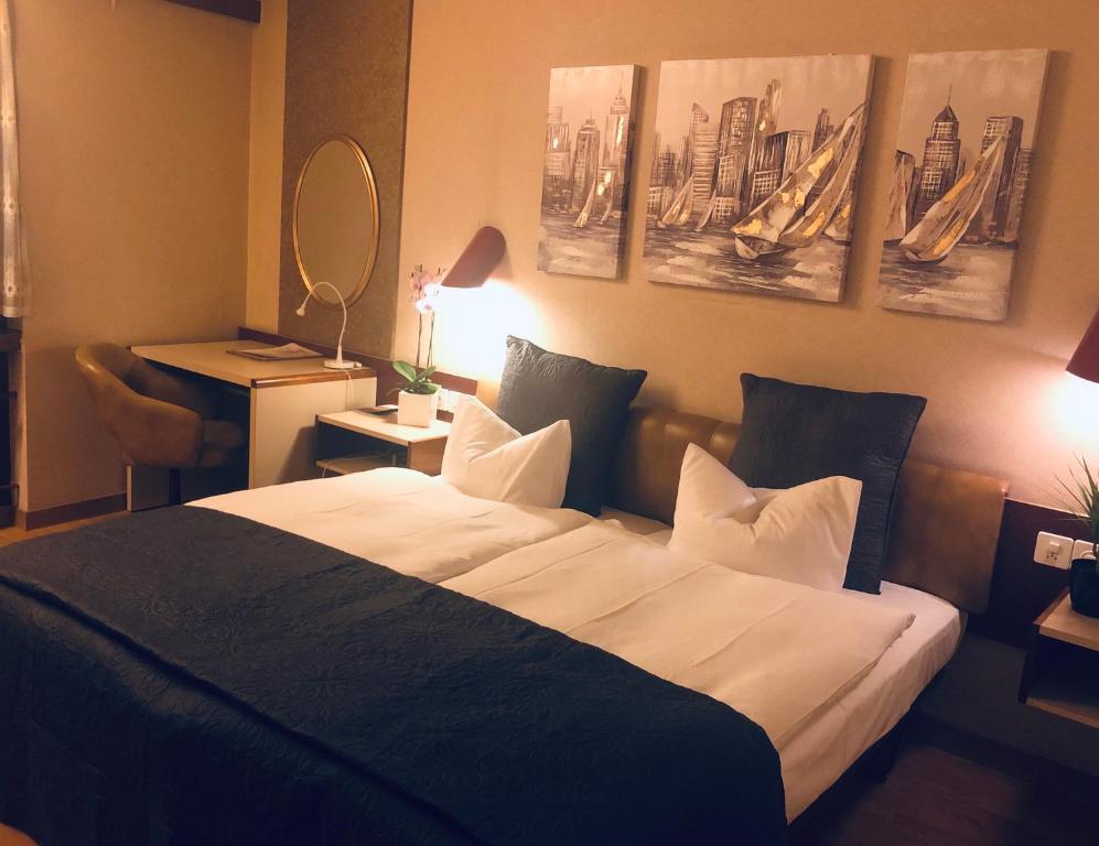 Giường trong phòng chung tại Hotel Casino