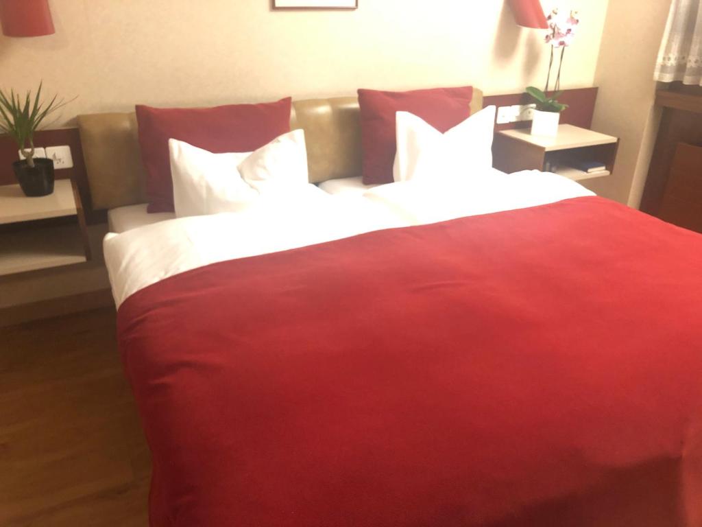 Postel nebo postele na pokoji v ubytování Hotel Casino