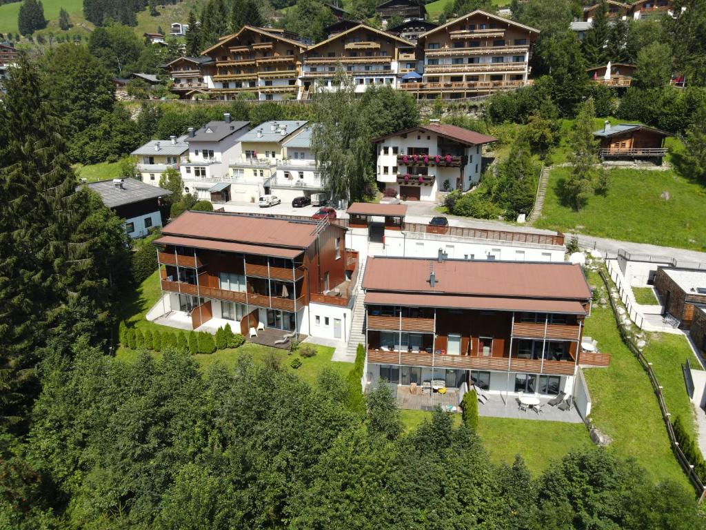 an aerial view of a house in a village at Schmitten Finest Apartments by All in One Apartments in Zell am See