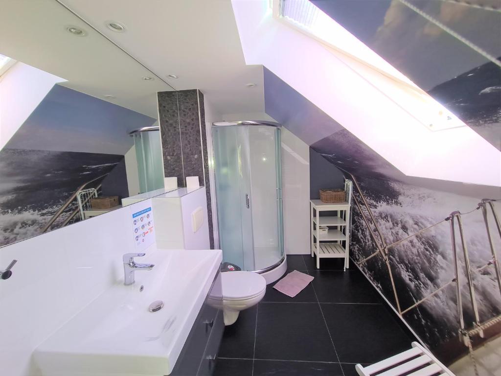 Kúpeľňa v ubytovaní Apartamenty Ekslibris