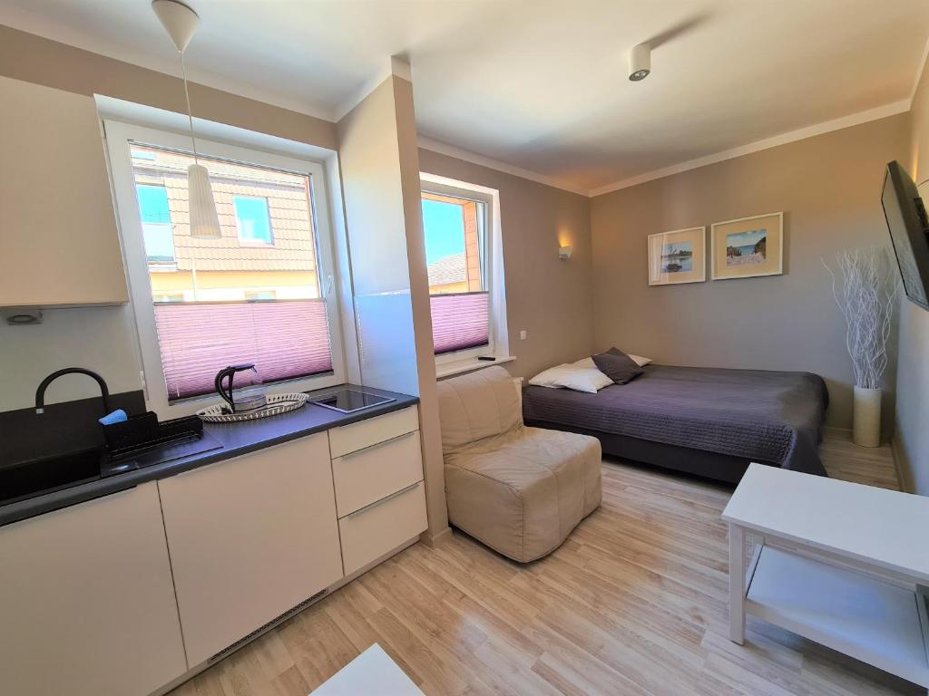 Kuchyňa alebo kuchynka v ubytovaní Apartamenty Ekslibris