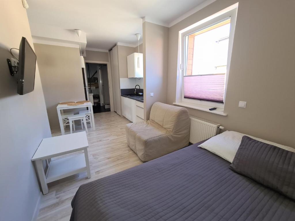 Posedenie v ubytovaní Apartamenty Ekslibris