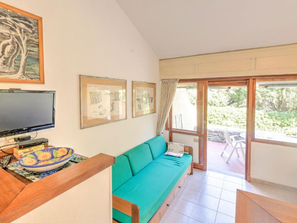 TV a/nebo společenská místnost v ubytování Beachside Holiday home in Punta Ala