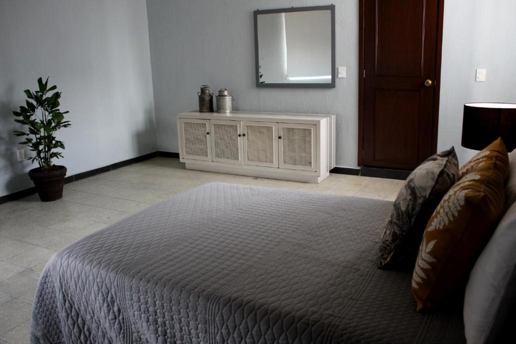 Postel nebo postele na pokoji v ubytování Casa Arrayan