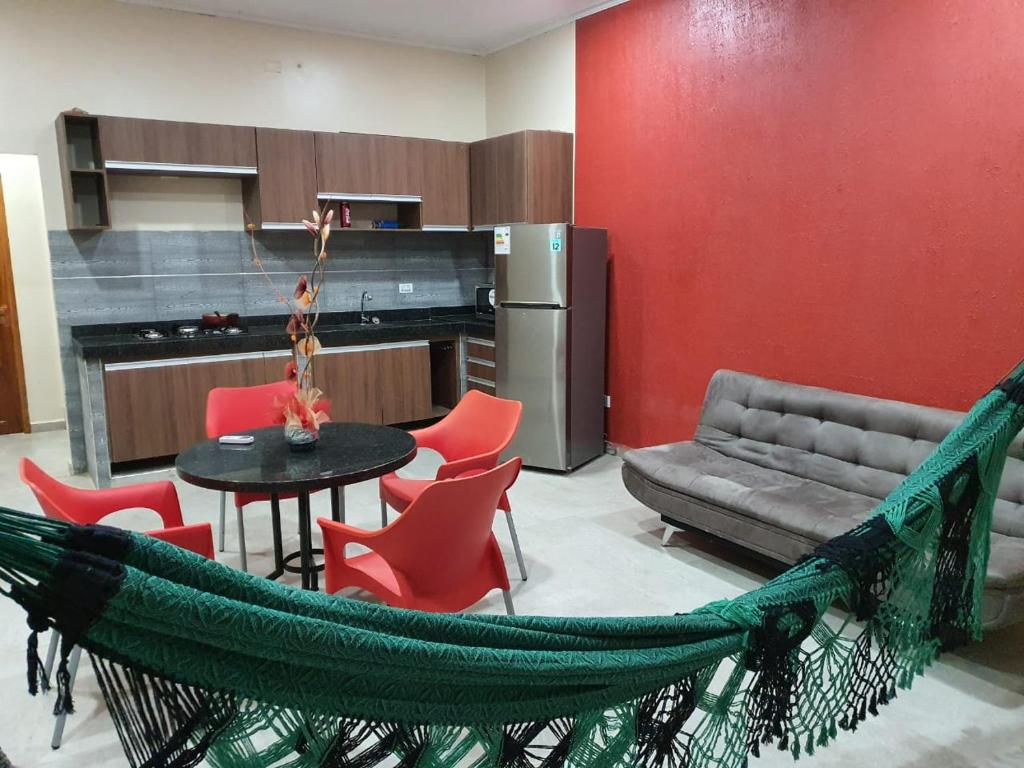 Η κουζίνα ή μικρή κουζίνα στο Tororoi Riberalta Apartments