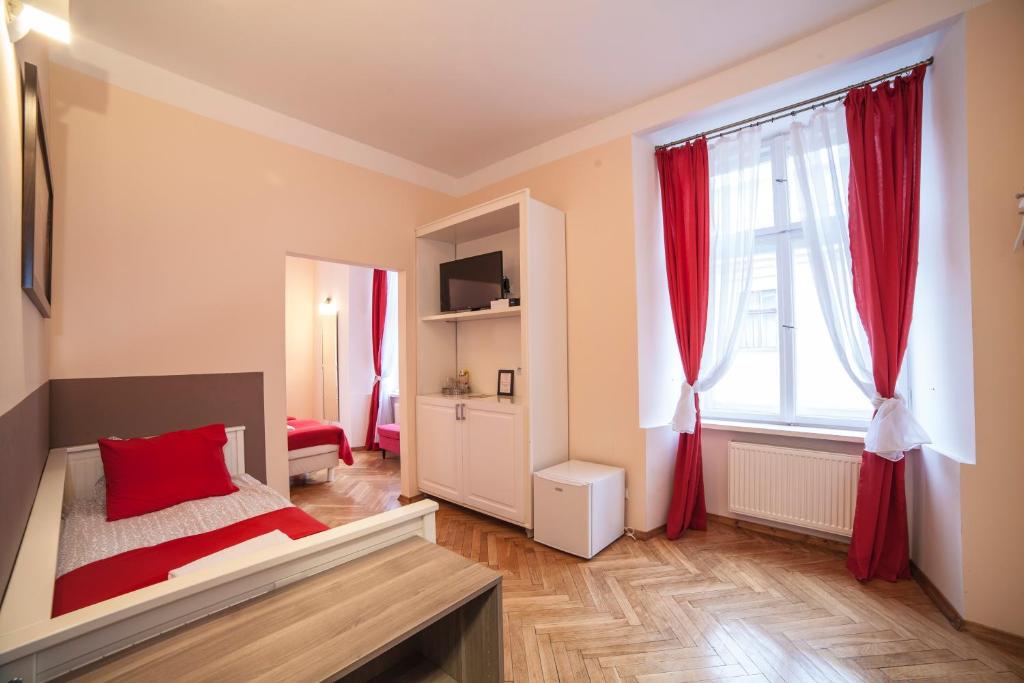 Posteľ alebo postele v izbe v ubytovaní Residence B&B La Fontaine Aparthotel