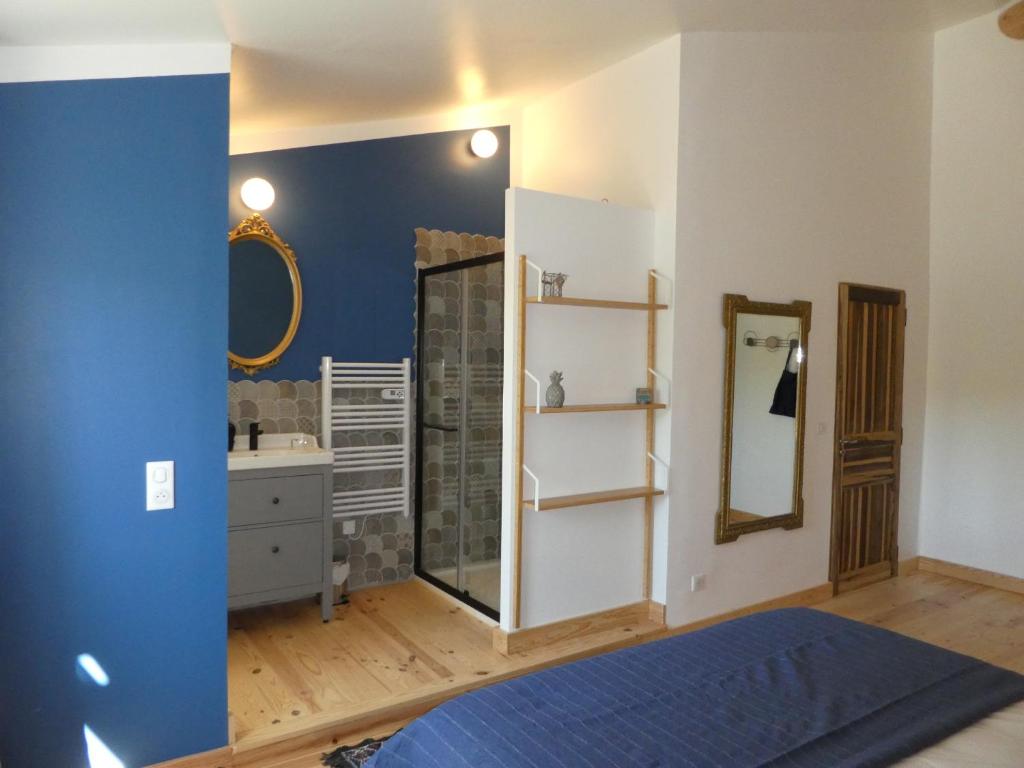 Postel nebo postele na pokoji v ubytování L'auguste maison d'hôtes