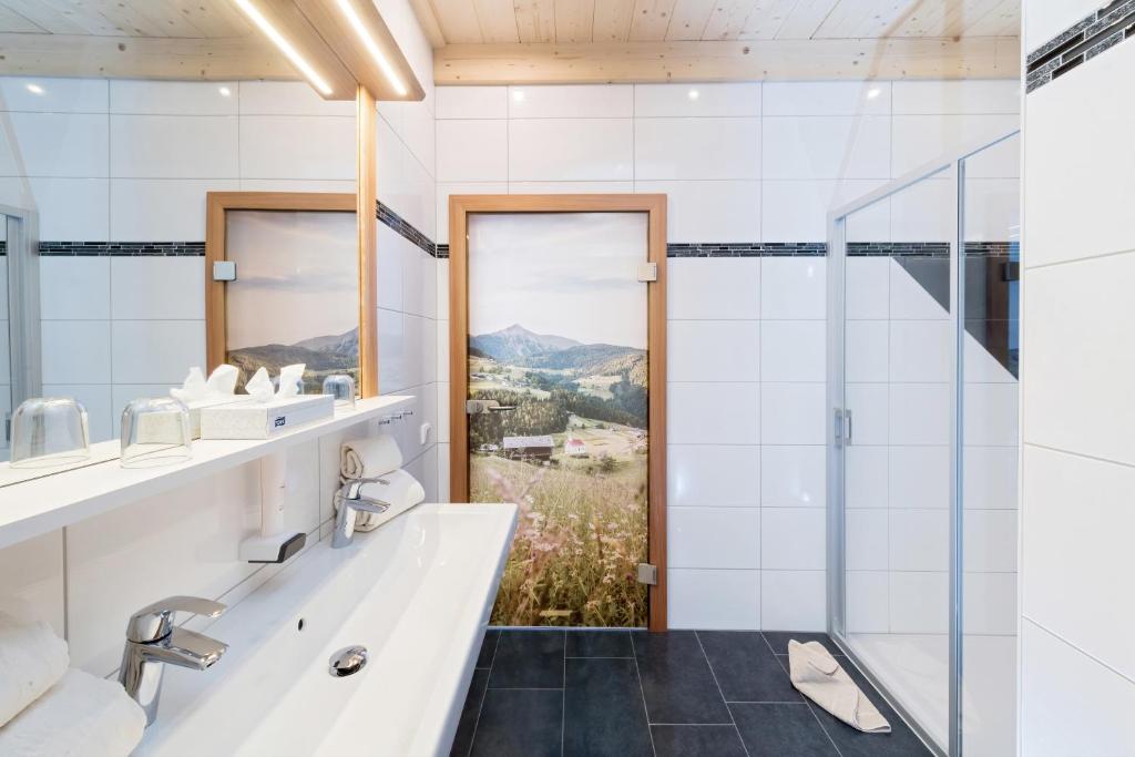 Koupelna v ubytování Alpenhotel Wanderniki