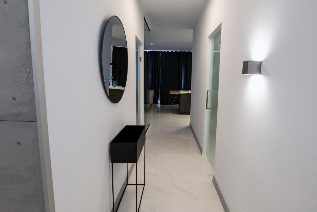 Televízia a/alebo spoločenská miestnosť v ubytovaní EL Apartments - Antares