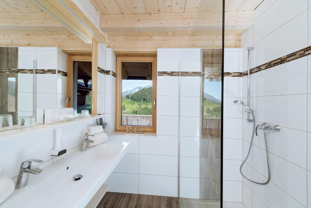 Koupelna v ubytování Alpenhotel Wanderniki