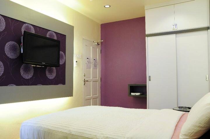 Letto o letti in una camera di The One Vacation Home