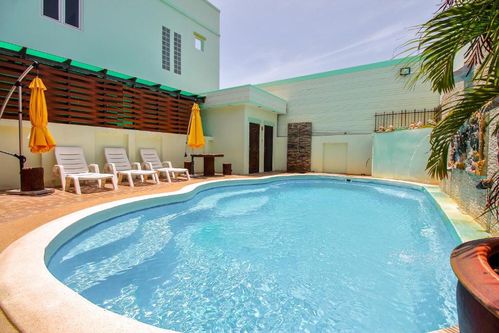 Bazén v ubytování Baan Noppadol Hua Hin Resort nebo v jeho okolí