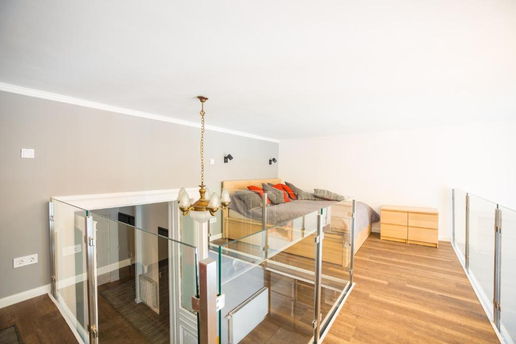 Posteľ alebo postele v izbe v ubytovaní Budapest Kálvin Apartman 2020