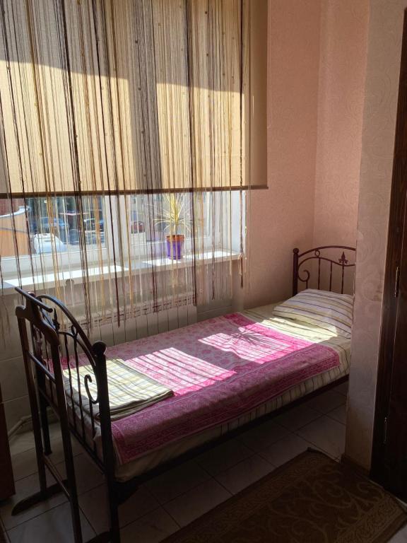 Postel nebo postele na pokoji v ubytování Centre Hostel