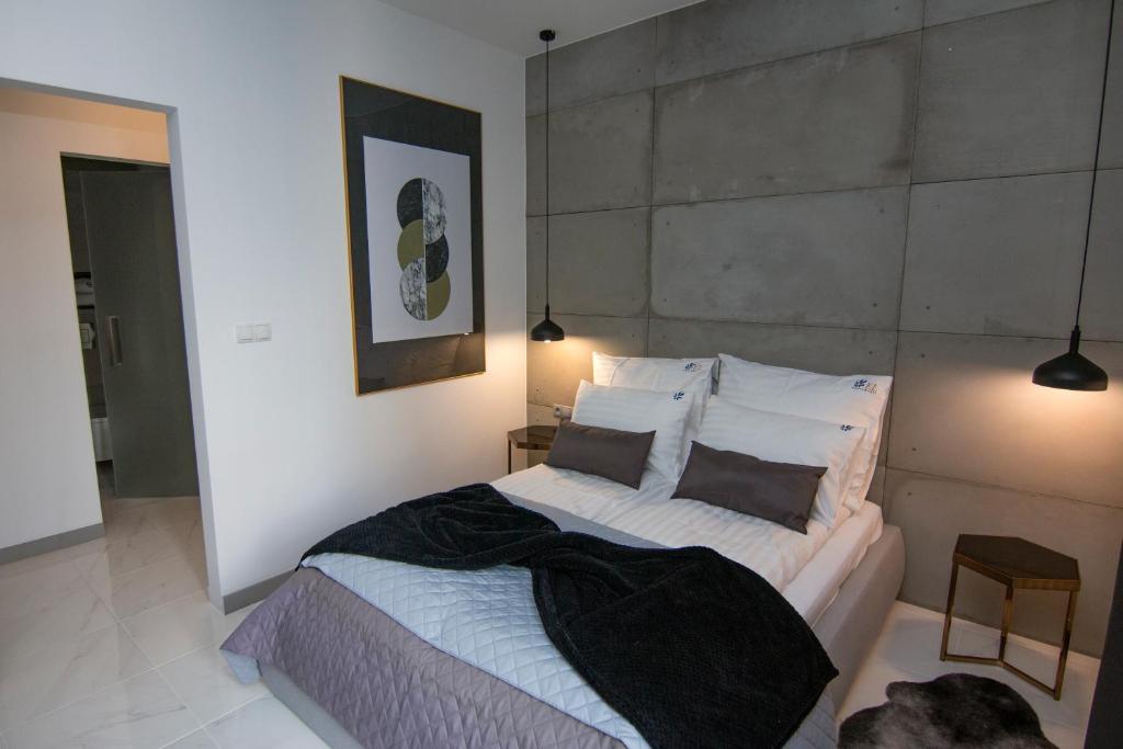 Posteľ alebo postele v izbe v ubytovaní EL Apartments - Antares