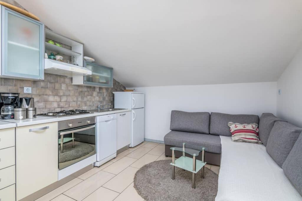 Kuchyň nebo kuchyňský kout v ubytování Apartment Windrose