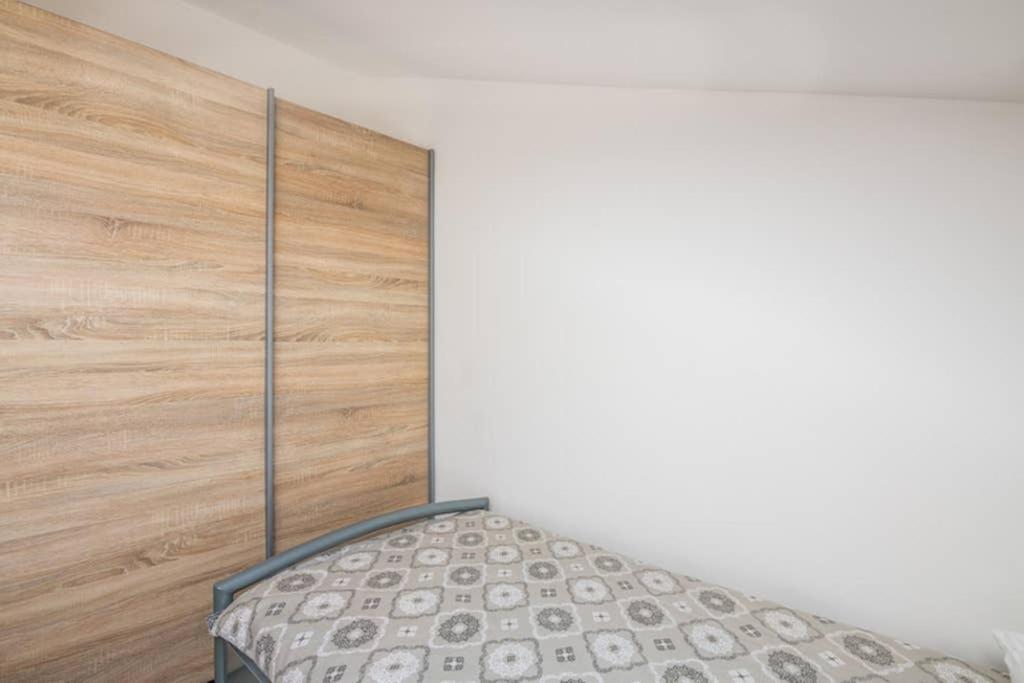 Postel nebo postele na pokoji v ubytování Apartment Windrose