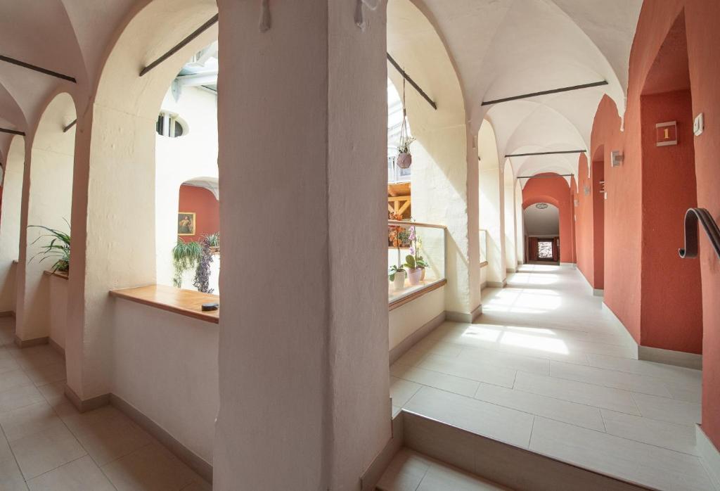 Postel nebo postele na pokoji v ubytování Hotel Gasthof Prunner