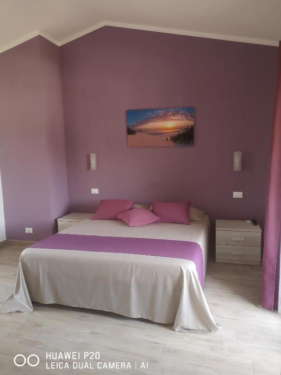 Postel nebo postele na pokoji v ubytování B&b Ajo' a mulinu Teulada