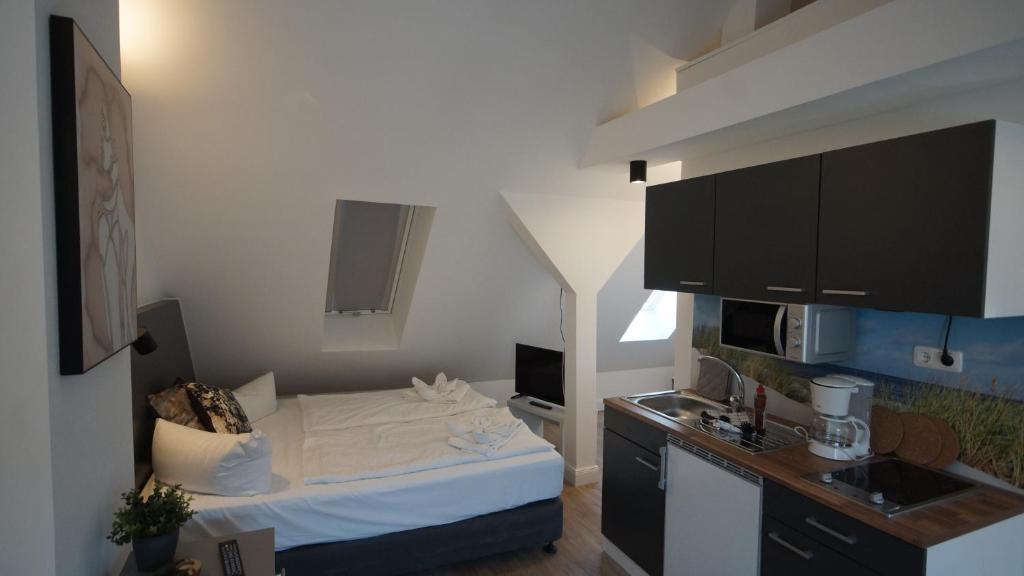 Kuchyň nebo kuchyňský kout v ubytování Hotel KO15