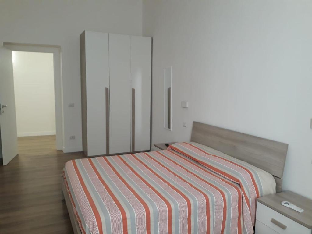 Postel nebo postele na pokoji v ubytování andri.trastevere