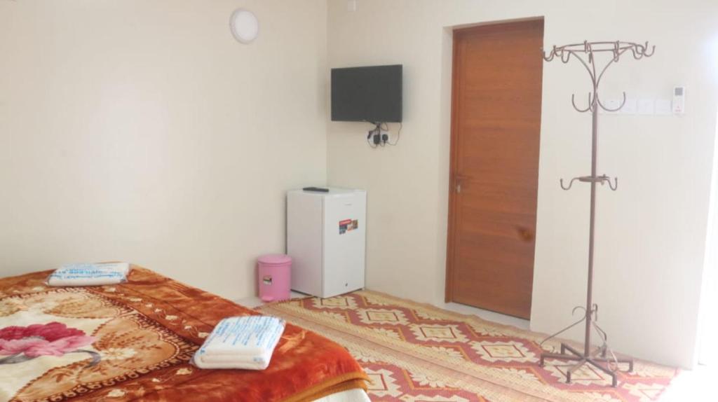 Postel nebo postele na pokoji v ubytování Jabel shams stars house