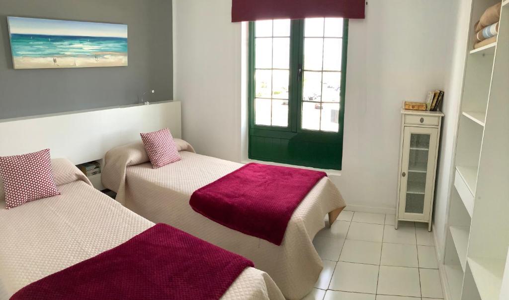 Postel nebo postele na pokoji v ubytování Vrys apartment close to the beach