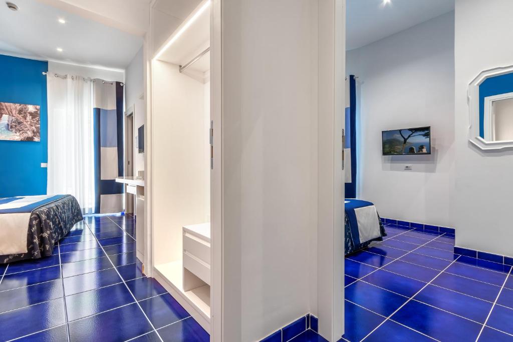 TV a/nebo společenská místnost v ubytování Hotel Metropole