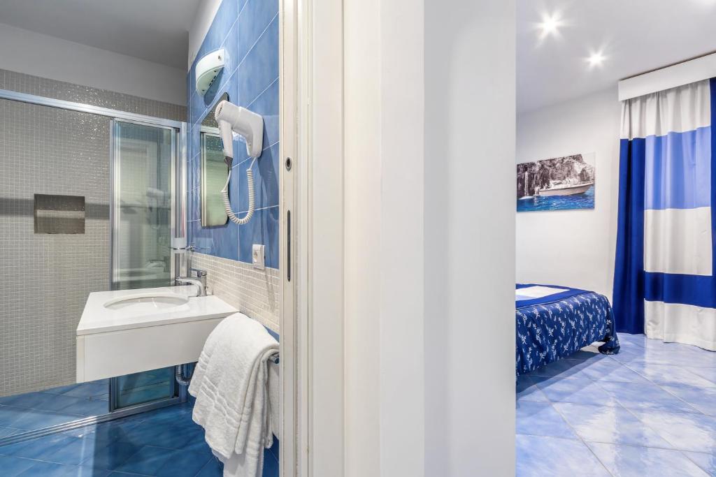 Koupelna v ubytování Hotel Metropole
