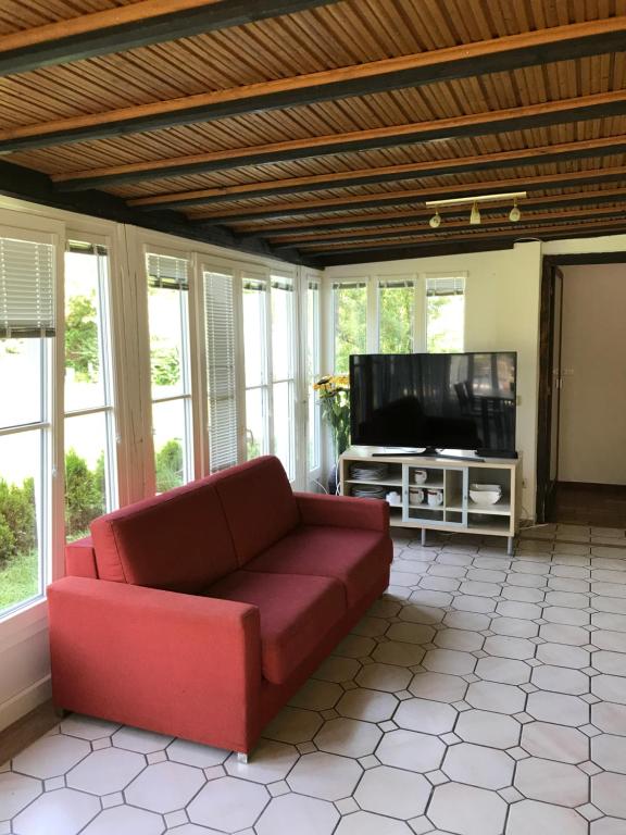 TV a/nebo společenská místnost v ubytování Apartementhaus Helene am Klopeinersee
