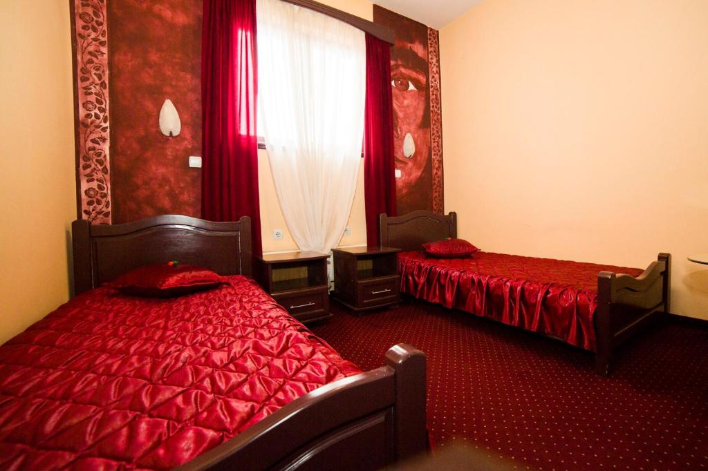 Postel nebo postele na pokoji v ubytování B&B Vila Tamaris